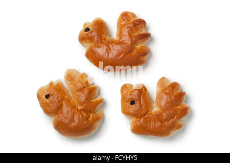 Three traditional palm sunday rolls in the shape of a rooster on white background Stock Photo