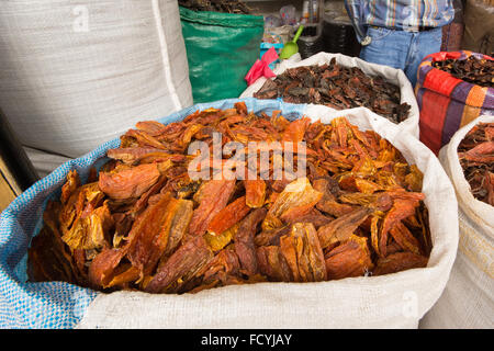 A sackful of dried chillis for sale at a Peruvian market. Stock Photo