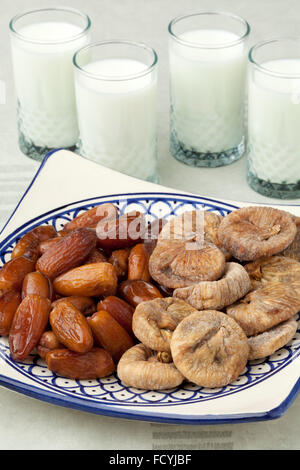 Moroccan dried figs and dates with milk for ramadan Stock Photo