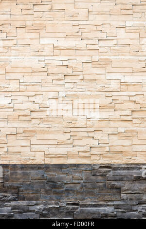 Pattern from lite brown decorative slate stone wall surface. For use as background. Stock Photo