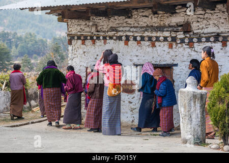 Worshippers at Tamshing Temple, Jakar, Bumthang, Central Bhutan, Asia Stock Photo