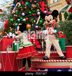 Holiday Mickey and Minnie Mouse on Christmas Parade in Magic Kingdom, Orlando, Florida Stock Photo
