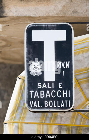 Vintage Italian Sali eTabacchi tobacco sales shop signpost in front of marquee on the facade of a house in Orvieto, Italy Stock Photo