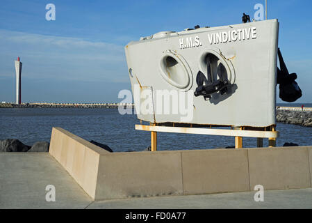 Bow of ship HMS Vindictive, World War One memorial, and Eastern dam in the Ostend / Oostende harbour, West Flanders, Belgium Stock Photo