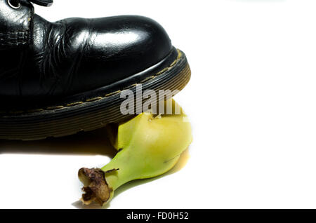 old shoe slips on a banana peel Stock Photo