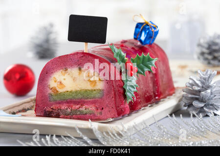 Chocolate swiss roll cake with Red berries Stock Photo