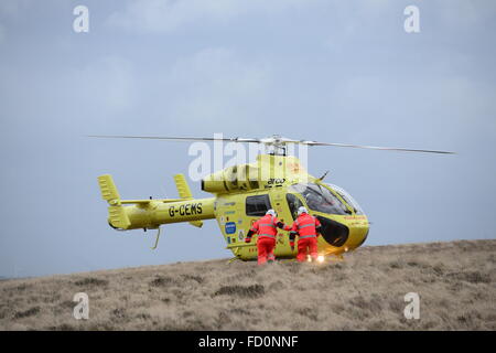 Yorkshire Air Ambulance attending an accident on the A628 Woodhead Pass, near Dunford Bridge, West Yorkshire, UK. Stock Photo