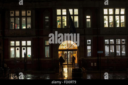 London, UK. 26th December 2016  Commuters sheltering from heavy rain under the arches of library in Buckingham Palace Road. Credit:  Chandra Prasad/Alamy Live News Stock Photo