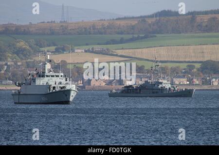 ENS Sakala (left) and ORP Flaming (right) are seen anchored off Greenock before participating in Exercise Joint Warrior 14-2. Stock Photo