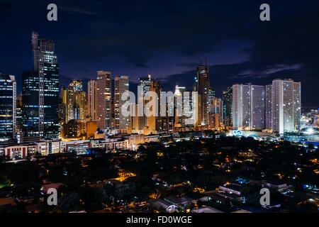 View of the skyline of Makati at night, in Metro Manila, The Philippines.
