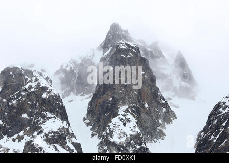 Spitsbergen, Svalbard, Magdalenefjord, Close up of snow-covered mountain peaks. Stock Photo