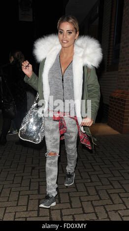 Katie Price leaves the New Woking Theatre with co-star Carla Nella having both appeared in a performance of the pantomime 'Sleeping Beauty'. When a photographer asked Katie if she had enjoyed her Christmas, he was blanked.  Featuring: Katie Price Where: L Stock Photo