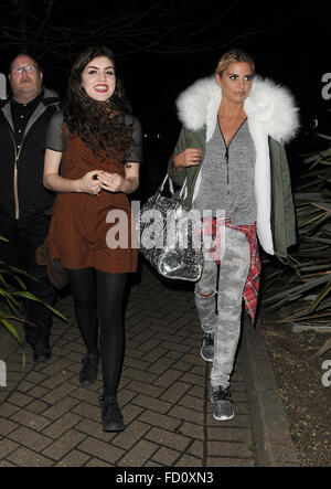 Katie Price leaves the New Woking Theatre with co-star Carla Nella having both appeared in a performance of the pantomime 'Sleeping Beauty'. When a photographer asked Katie if she had enjoyed her Christmas, he was blanked.  Featuring: Carla Nella, Katie P Stock Photo