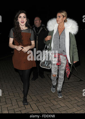 Katie Price leaves the New Woking Theatre with co-star Carla Nella having both appeared in a performance of the pantomime 'Sleeping Beauty'. When a photographer asked Katie if she had enjoyed her Christmas, he was blanked.  Featuring: Carla Nella, Katie P Stock Photo