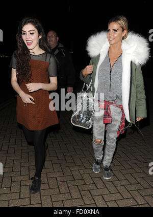 Katie Price leaves the New Woking Theatre with co-star Carla Nella having both appeared in a performance of the pantomime 'Sleeping Beauty'. When a photographer asked Katie if she had enjoyed her Christmas, he was blanked.  Featuring: Carla Nella, Katie P Stock Photo