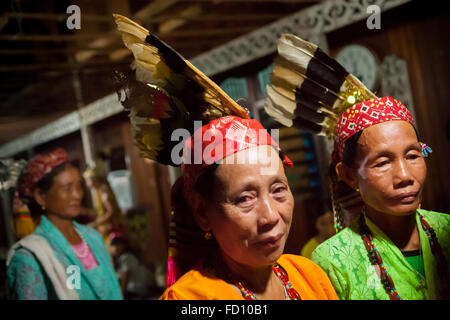 Portrait of Dayaknese women of Taman sub-ethnic group inside Bali Gundi longhouse in Kapuas Hulu, West Kalimantan, Indonesia. Stock Photo