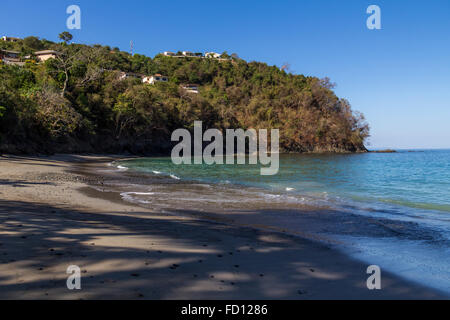 Morning on a beach in Costa Rica Pacific whit houses view Stock Photo