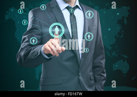 Touching Contact Us Concept on Visual Screen. Businessman pressing button Stock Photo