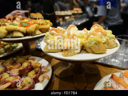 Pintxos served on the bar of a popular pintxo bar in San Sebastian, Basque country, Spain. Stock Photo