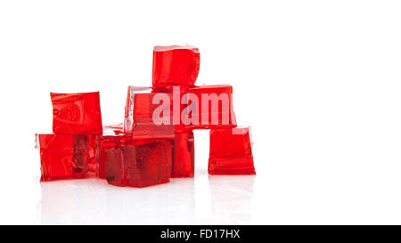 Cubes of red jelly on white background Stock Photo