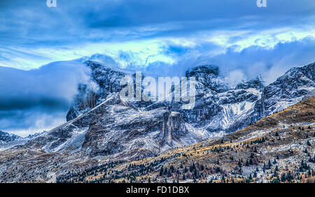 Impressive landscape with clouds gathering on the peaks in Le Dévoluy Massif in Hautes-Alpes, France. Stock Photo