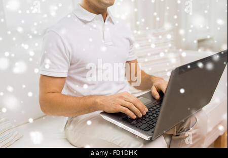close up of man working with laptop at home Stock Photo
