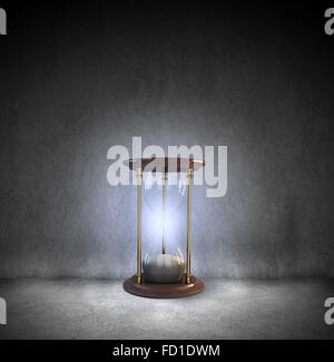 Conceptual image with huge sandglass. Time concept Stock Photo