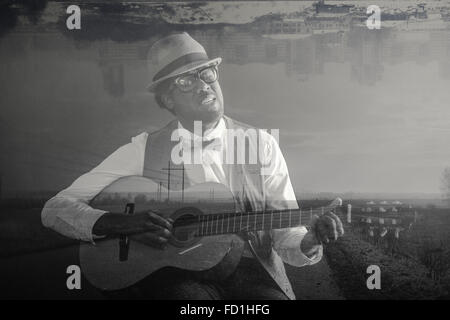 African American man playing guitar Stock Photo - Alamy