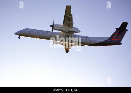 Brussels Airlines Dash-8 G-ECOI landing at Birmingham Airport, UK Stock Photo