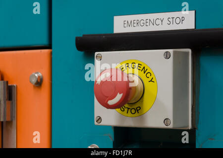 A close up of an emergency stop button or kill switch on a machine Stock Photo