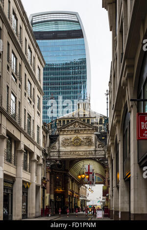 Juxtaposition of old and new buildings in the City of London. (Walkie Talkie Building and Leadenhall Market) Stock Photo