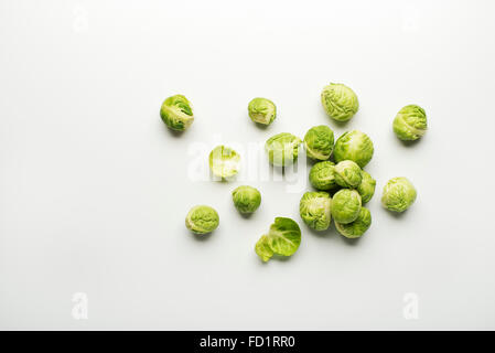 Fresh raw Brussels sprouts isolated on a white background. Stock Photo
