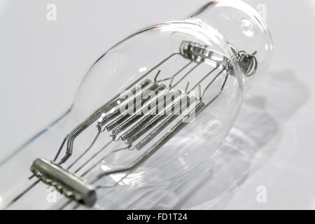 Incandescent lamp emitting light as a result of being heated. Stock Photo