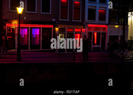 Rosse Buurt (The red light district) of Amsterdam is famous for their windows with prostitutes, since this activity is legalized Stock Photo