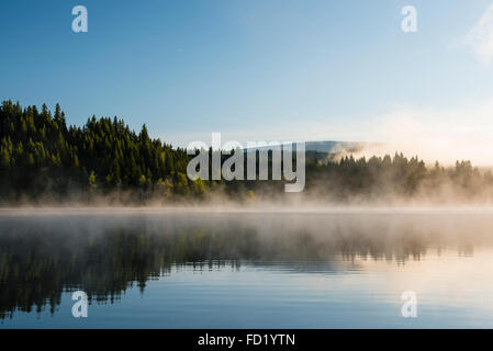Fog above lake, Dutch Lake, Clearwater, British Columbia, Canada Stock Photo
