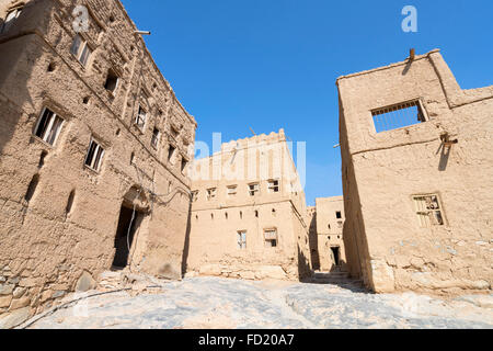 View of abandoned old mud houses in Al Hamra Oman Stock Photo