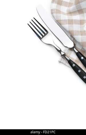 knife, fork and checkerd napkin on white background Stock Photo