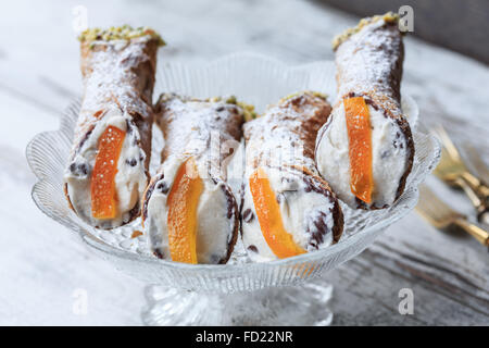 Sicilian cannoli on cake stand Stock Photo