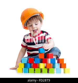Kid boy as a construction worker in protective helmet Stock Photo