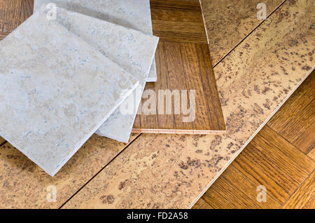 ceramic tile, cork and parquet wooden flooring samples for home interior remodel Stock Photo