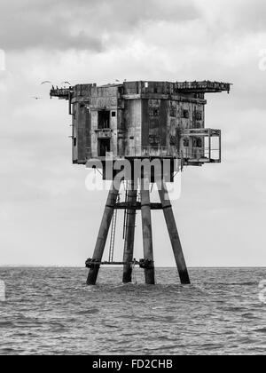 A black and white image of Maunsell Forts in Thames Estuary Stock Photo