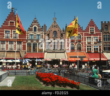 Belgium, Bruge, bicycles parked in Market Square, with  local cafes. Stock Photo