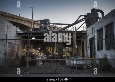 Los Angeles, California, USA. 20th May, 2014. A closed paper-shredding facility along the 6th Street Bridge, east of the LA River, remains lit up at twilight. © Fred Hoerr/ZUMA Wire/Alamy Live News Stock Photo
