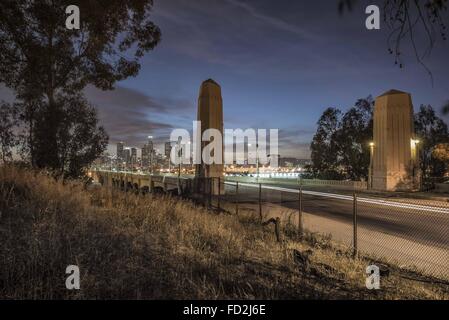 April 26, 2015 - Los Angeles, California, U.S - Downtown LA, as seen from the eastern end of 6th Street Bridge and it's deco concrete pillars. (Credit Image: © Fred Hoerr via ZUMA Wire) Stock Photo