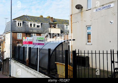 Former council flats estate for sale in Brighton with Estate Agent boards Stock Photo