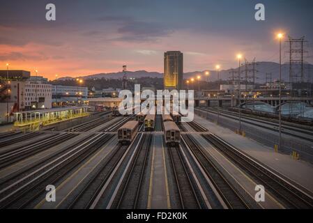 June 28, 2015 - Los Angeles, California, U.S - LA County MTA and Metro Red Line  along the LA River at dusk, from 4th Street Bridge. (Credit Image: © Fred Hoerr via ZUMA Wire) Stock Photo