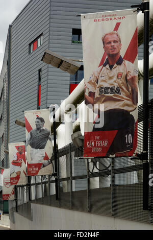 Ken Friar Bridge with flags of Arsenal legend Dennis Bergkamp, Emirates Stadium, Highbury, London, England Stock Photo