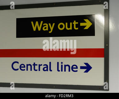 Sign in an underground station in London with right arrows to way out and the Central line Stock Photo