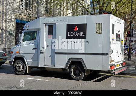 Side view of Loomis cash & valuables transport business company operating high security armoured van London England UK Stock Photo