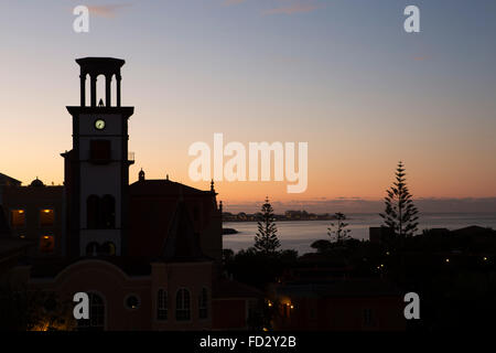 Dawn breaks over the Gran Hotel Bahia del Duque at the Costa Adeje in Tenerife, Spain. Stock Photo